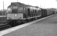 A train recently arrived from Kyle behind a type 2 stands at Dingwall in 1963.<br><br>[Colin Miller //1963]
