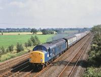 40077 with a northbound ECML train passing Shipton, North Yorkshire, on 15 August 1980.<br><br>[Peter Todd 15/08/1980]