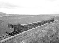 D3929 with a ballast train during PW works at Kilruskin cutting near West Kilbride on Easter Sunday 14 April 1963. [See image 36500]<br><br>[R Sillitto/A Renfrew Collection (Courtesy Bruce McCartney) 14/04/1963]