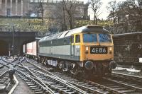 Although this particular day was a Saturday, the 11.50 Freightliner service from Aberdeen to Kings Cross, depicted here behind Brush Type 4 No. D1997, was a regular working through Waverley station on most days. The train ran 'Fridays excepted', presumably because the main traffic was perishables for the London markets, and the Saturday working was particularly interesting in that it recessed for almost 24 hours at Gosforth (can anyone explain why <br>
there?) before continuing on its way to London at 16.50 on the Sunday afternoon.<br><br>[Bill Jamieson 25/04/1970]