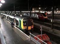 Evening departures from Euston on 11 November 2011. The 350 on the left is the 17.46 to Birmingham New Street.<br><br>[Ken Strachan 11/11/2011]