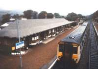 A train for Mallaig calls at Spean Bridge in July 1991.<br><br>[Ian Dinmore /07/1991]
