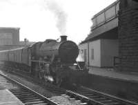 The north end of Carlisle station on 12 April 1963 sees Jubilee 45560 <I>'Prince Edward Island'</I> preparing to leave platform 3 and head north with the 9.15am Manchester - Glasgow Central.<br><br>[K A Gray 12/04/1963]