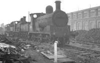Ex-L&Y 0-6-0 no 52139 stands in line for the cutter's torch in the sidings alongside Horwich Works in September 1960.<br><br>[K A Gray 25/09/1960]