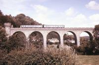 A DMU crossing Knucklas Viaduct, Powys, on the Central Wales line in September 1987.<br><br>[Ian Dinmore /09/1987]