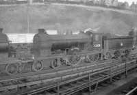 A resident of Hawick shed throughout the post-nationalisation period, ex-NBR Scott class 4-4-0 no 62428 <I>The Talisman</I> stands in the yard at 64G in 1958. The locomotive was withdrawn by BR at the end of December that year. [See image 36094]<br><br>[Robin Barbour Collection (Courtesy Bruce McCartney) //1958]