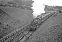 A train heading for Largs in the summer of 1962, photographed to the north of West Kilbride. <br><br>[R Sillitto/A Renfrew Collection (Courtesy Bruce McCartney) //1962]