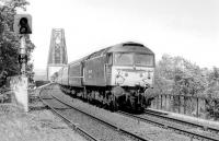 47768 eases off the Forth Bridge and with a southbound passenger train, seen from Dalmeny station in August 1995.<br><br>[Bill Roberton /08/1995]