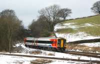 An East Midlands service to Manchester passes Chinley East Junction on 29 December 2009 - in a rather more seasonal landscape than is the case in 2011!<br><br>[John McIntyre 29/12/2009]