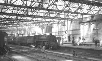 Standard Class 4 2-6-0 no 76049 brings the late running 9.50am Edinburgh Waverley - Leeds City into Carlisle on 7 August 1965. The locomotive had taken over the train at Hawick, following removal of St Margarets V2 no 60970, with an injector fault.<br><br>[K A Gray 07/08/1965]