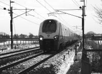 A northbound Voyager heading to Scotland passes through the Brock area between Preston and Lancaster on 10 January 2010 in seasonal conditions.<br><br>[John McIntyre 10/01/2010]