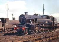 Smart looking Fairburn 2-6-4T no 42143 photographed on Polmadie shed in September 1959.<br><br>[A Snapper (Courtesy Bruce McCartney) 26/09/1959]