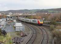 Seen from the modern day bridge over the Llandudno branch a 10-car Voyager approaches the station at Llandudno Junction on a Holyhead to Euston Service. 221111 was leading 221110 on this occasion.  <br><br>[Mark Bartlett 29/11/2011]