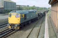 26036 reverses a ballast train into the ballast loading depot which was formerly located at Larbert. The view is from the signalbox and looks north in 1990.<br><br>[Ewan Crawford //1990]