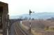 EE Type 4 No. 367 and its Millerhill to Inverness freight are cautioned by the Hilton Junction distant signal in <br>
anticipation of being stopped to give the 15.10 Glasgow to Dundee train precedence. The semaphore distant to the right was for Bridge of Earn. 3rd March 1971<br><br>[Bill Jamieson 03/03/1971]