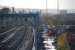 View west towards Paisley with the Town Hall's tower on the left. This view looks along the former trackbed of the line to Renfrew with Greenlaw Goods on the right of the picture, currently in use as a site for the remodelling works [see image 19863].<br><br>[Ewan Crawford 27/11/2011]