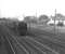 70014 <I>'Iron Duke'</I> is about to run through Beattock station with a southbound parcels train in the 1960s. The Moffat branch line is to the right. <br><br>[K A Gray //]