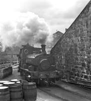 The distillery pug hard at work in Dailuaine Distillery, by Carron on the Speyside Line, in 1967.<br><br>[Frank Spaven Collection (Courtesy David Spaven) //1967]