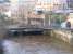 Looking west along the River Kelvin from Great Western Road on 2 December 2011. In the middle distance is the bridge that carried the Glasgow Central Railway over the river and on which the platforms of Kelvin Bridge station once stood. To the right of the bridge the line passed below Caledonian Crescent, then ran in the open for about 100 yards, before entering the long tunnel running below Great Western Road, eventually emerging at Botanic Gardens station [see image 10426]. <br><br>[John McIntyre 02/12/2011]