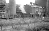 In 1971, the British Aluminium Company's Burntisland works obtained two Fowler 0-4-0DMs from United Fireclay Products, Bathville, West Lothian, to replace their steam pugs. One of them was photographed from a passing train in 1973. The works has since been demolished, with housing now covering most of the site.<br><br>[Bill Roberton //1973]
