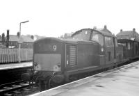 Clayton D8502 with a freight at Kilwinning in May 1963. The locomotive had been delivered new to Polmadie in October 1962 and was withdrawn from the same location exactly 9 years later. D8502 was cut up at St Rollox in March 1973.<br><br>[R Sillitto/A Renfrew Collection (Courtesy Bruce McCartney) 25/05/1963]