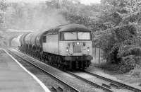 56103 nears Aberdour with a Thornton - Mossend freight in 1995, mainly comprising CO2 tanks from Cameron Bridge.<br><br>[Bill Roberton //1995]