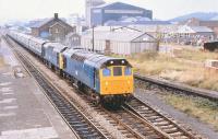 A southbound passenger train at Craven Arms on 18 August 1979 double-headed by 25122+25156.<br><br>[Peter Todd 18/08/1979]
