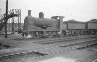 Ex-L&Y Class 27 0-6-0 no 52270, of 1894 vintage, stands in the shed yard at Longsight MPD, Manchester, on 27 September 1958.<br><br>[Robin Barbour Collection (Courtesy Bruce McCartney) 27/09/1958]