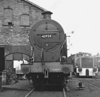 Midland 4F 0-6-0 43924 in the yard at Haworth in March 1976, carrying a 55F Manningham shed plate. [See image 37315 for the same scene thirty six years later.] <br><br>[Bill Jamieson 28/03/1976]