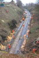 The cutting to the north of the tunnel at Kinghorn being cleared of vegetation and stabilised during line occupation on Sunday 12 February 2012.<br><br>[Bill Roberton 12/02/2012]