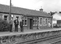 The photographer's son and the remaining BR staff survey the scene at Carron station on the Speyside Line in 1967, a year before final closure. [See image 1891]<br><br>[Frank Spaven Collection (Courtesy David Spaven) //1967]