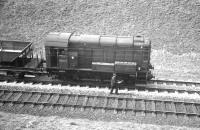 Reballasting work underway in Kilruskin cutting, West Kilbride, on Easter Sunday 1963. Horwich built class 08 no D3929 had arrived at Ardrossan shed ex-works two years earlier. [See image 36606]<br><br>[R Sillitto/A Renfrew Collection (Courtesy Bruce McCartney) 14/04/1963]