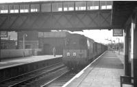 An EE Type 1 brings a freight south through Beattock station in the summer of 1962.<br><br>[R Sillitto/A Renfrew Collection (Courtesy Bruce McCartney) 14/07/1962]