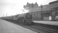A2 60532 <I>'Blue Peter'</I> arrives at Stirling on 28 March 1964 with the 5.30pm Glasgow Buchanan Street - Aberdeen.<br><br>[K A Gray 28/03/1964]