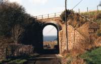 'Light railway' engineering north of Maidens in March 2012: masonry bridge with blue engineering brick arch over track from Morriston to Ardlochan looking west.<br><br>[Colin Miller 03/03/2012]