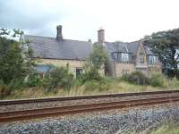 View north across the Newcastle & Carlisle line in September 2011 towards the former Gilsland station. Closed to passengers in 1967, the building is now a private residence. [See image 22045]<br><br>[Andrew Wilson 06/09/2011]