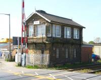 The substantial stone signal box alongside the busy level crossing at Castlegate, Malton, looking south in May 2009. Malton station is half a mile off to the right [see image 23497].<br><br>[John Furnevel 22/04/2009]