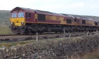 66133 + 66016 heading south from Blea Moor Sidings on 18 April 2011 with a container train.<br><br>[Andrew Wilson 18/04/2011]