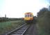 The Lea Valley Railway Club <I>'Royal Duchy'</I> railtour visiting the china clay sidings at Meledor Mill, Cornwall, on 30 April 1977. The DMU is preparing to leave on the next leg of the tour to Newquay via St Dennis Junction.<br><br>[Ian Dinmore 30/04/1977]