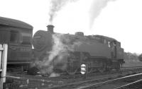 Beattock shed's BR Standard class 4 2-6-4T no 80004 in position at the rear of a passenger train stopped at Beattock station in July 1962 ready to provide assistance on the ascent.<br><br>[R Sillitto/A Renfrew Collection (Courtesy Bruce McCartney) 14/07/1962]