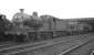 Fowler 4F no 44390 is one of a number of locomotives standing in the shed yard at Workington on Saturday 22 September 1962.<br><br>[K A Gray 22/09/1962]