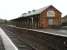 View west at Porthmadog station on 8 December 2011. The building now houses the <I>'Station Inn'</I> pub and cafe.<br><br>[David Pesterfield 08/12/2011]