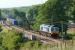 <I>'James the Engine'</I> aka DRS no 66414, in 'Stobart Rail' livery, hauls a southbound container train through the Oubeck loops south of Lancaster on 22 May 2010.<br><br>[John McIntyre 22/05/2010]