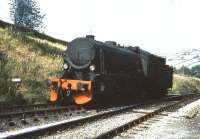 WD 2-8-0 no 1931 running round at Oxenhope in 1976. Built Vulcan Foundry January 1945, sold to NS, sold on to SJ in 1953, 'Swedified'; brought back to the UK by KWVR in 1973. Extensive rebuild, 8 wheel tender found, numbered at the end of the BR sequence as 90733. [See image 31043 for current configuration]<br>
<br><br>[Colin Miller //1976]