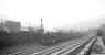 An unidentified V3 2-6-2T with a westbound parcels train passes Gateshead shed between Greensfield and King Edward Bridge Junction, thought to be in the early 1960s. The original 1862 shed at Chaytor's Bank stands in the right background - the roundhouse latterly serving as the Gateshead Works paint shop.<br><br>[K A Gray //]