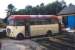 Train? What train? The Sutherland mail bus straddles both tracks at Lairg in 1979, awaiting its customary load of parcels and mail from the morning train ex-Inverness. [See image 38820]<br><br>[Frank Spaven Collection (Courtesy David Spaven) //1979]