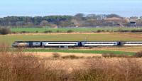 An East Coast train heading north on the ECML at Longhoughton, Northumberland, on 11 March 2012.<br><br>[John Steven 11/03/2012]
