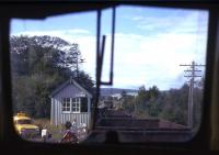 Lairg North box seen from the rear of a Type 2-hauled engineer's train on a fine Summers day in 1974. The photographer was en route from Inverness to Rogart to earn overtime on PW duties, joining a local gang clearing up the debris left by a freight train derailment.<br><br>[David Spaven //1974]
