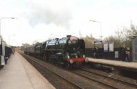 Having handed over the 'Cumbrian Mountain Express' to 86259 at Farington Junction for the return to Euston, 70013 with support coach and WCRC 37676 head through Lostock Hall on 31 March 2012 on their way back to Carnforth.<br><br>[John McIntyre 31/03/2012]
