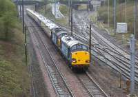 Day 1 of the Pathfinder 'Easter Chieftan' railtour on 6 April 2012 was from Exeter to Dumbarton Central. Seven and a half hours into the journey sees the pair of DRS Class 37s  at Farington Curve Junction on the approach to Preston.<br><br>[John McIntyre 06/04/2012]